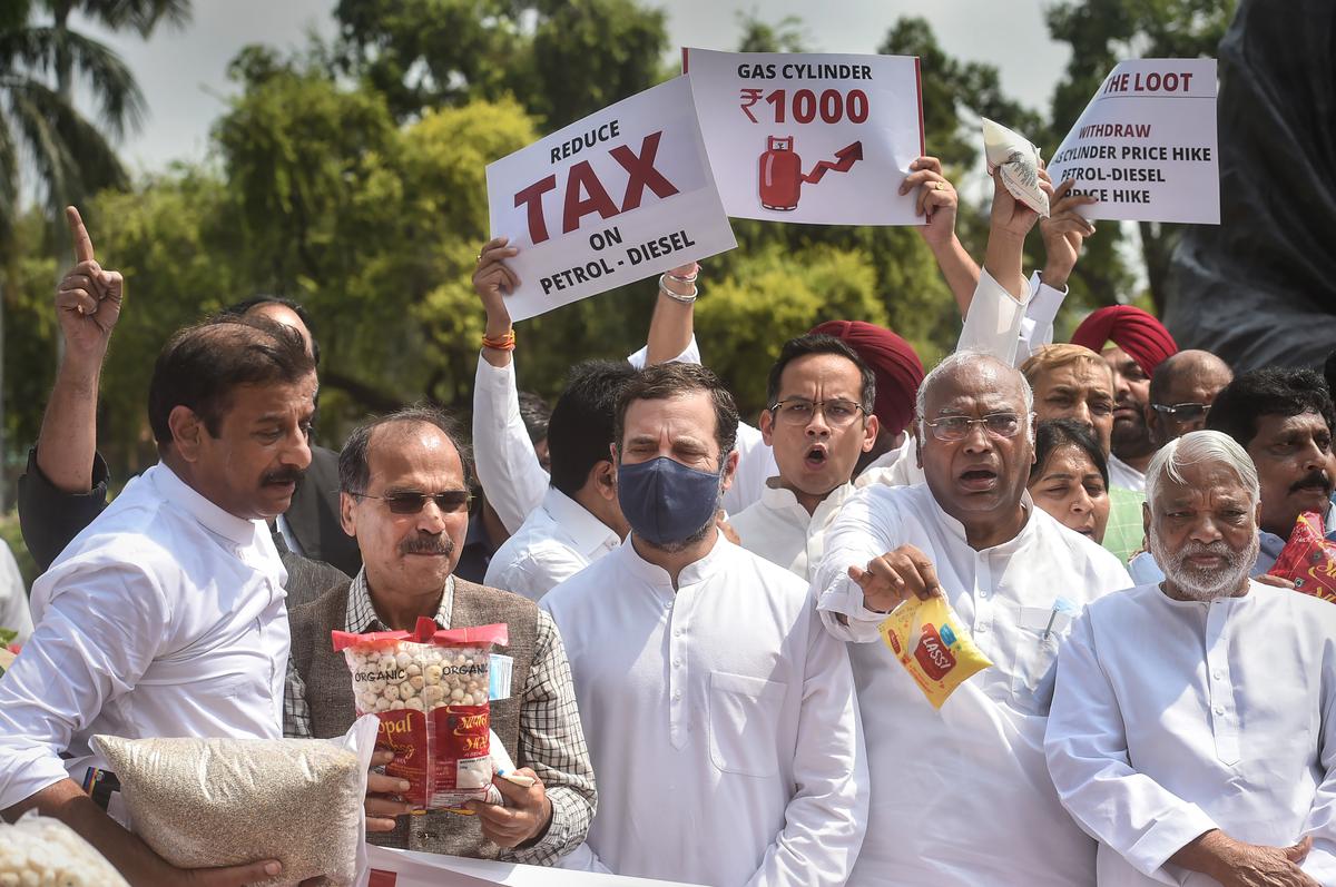 Congress MP Rahul Gandhi with Mallikarjun Kharge, Adhir Ranjan Chowdhury and other Opposition MPs during a protest against inflation and the decision to increase GST on food items, at Parliament complex, in New Delhi, on Wednesday, July 20, 2022.