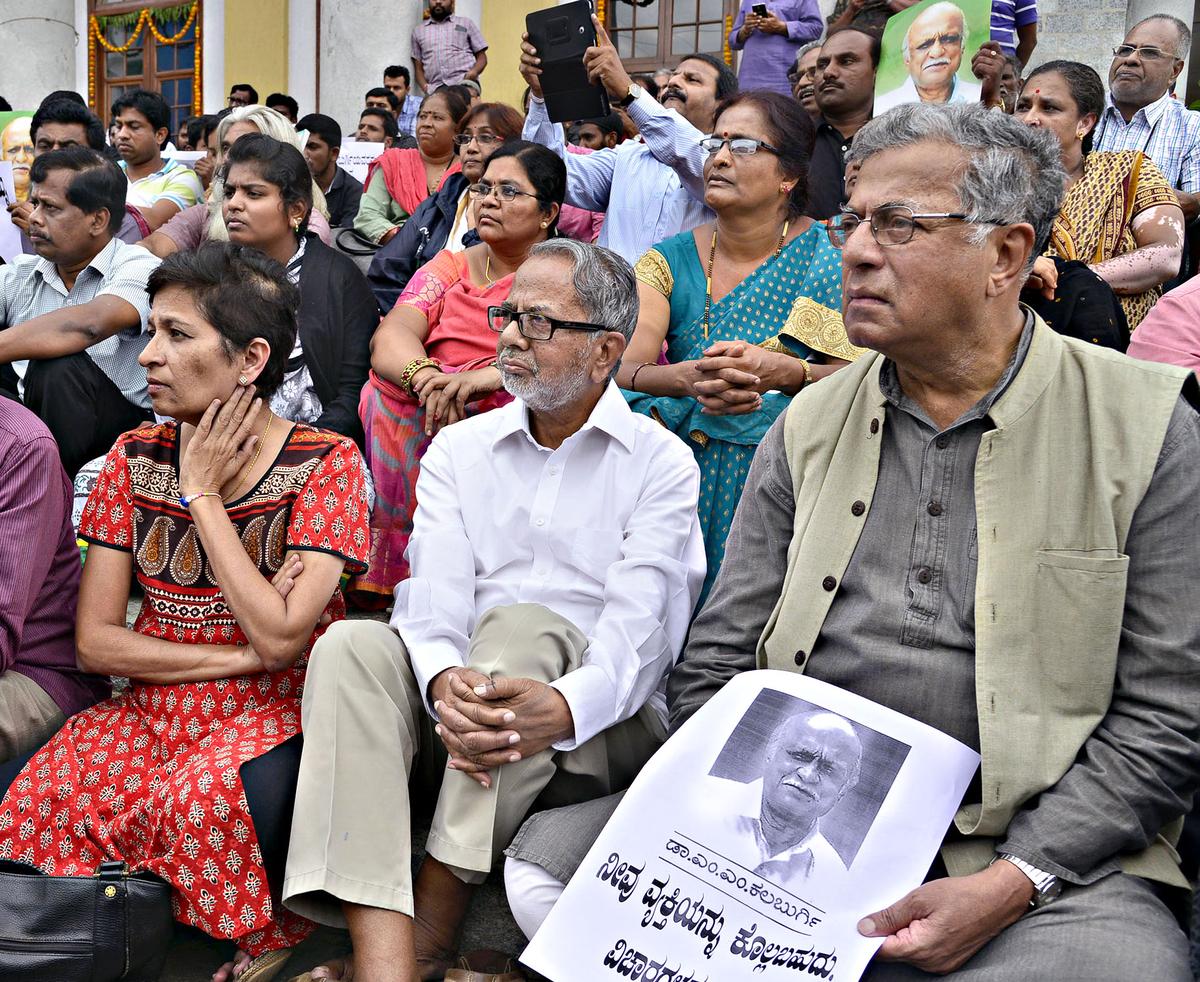 (Left to right) Journalist Gauri Lankesh, writer K. Marulasiddappa and actor Girish Karnad attend a condolence meeting for slain scholar MM Kalburgi in Bengaluru, August 2015.