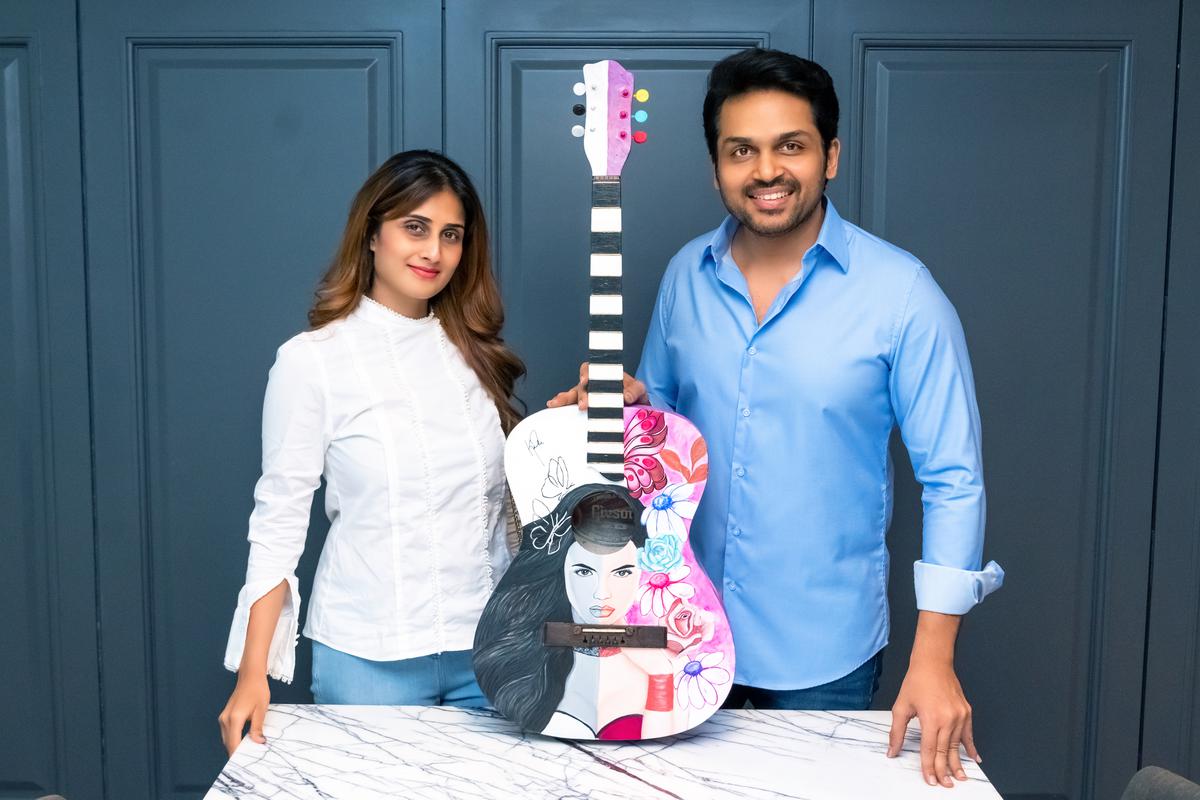 Actor Karthi is auctioning his favourite guitar for a cause. Maybe ...
