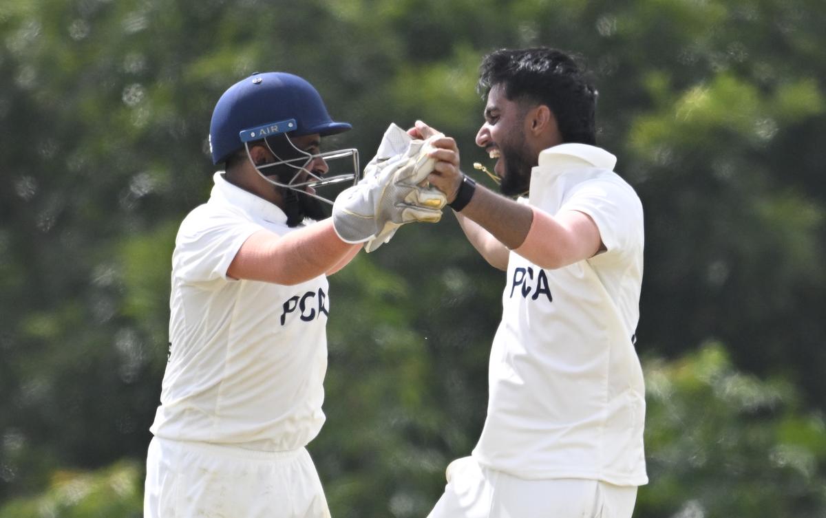 Markande celebrates the fall of a wicket.