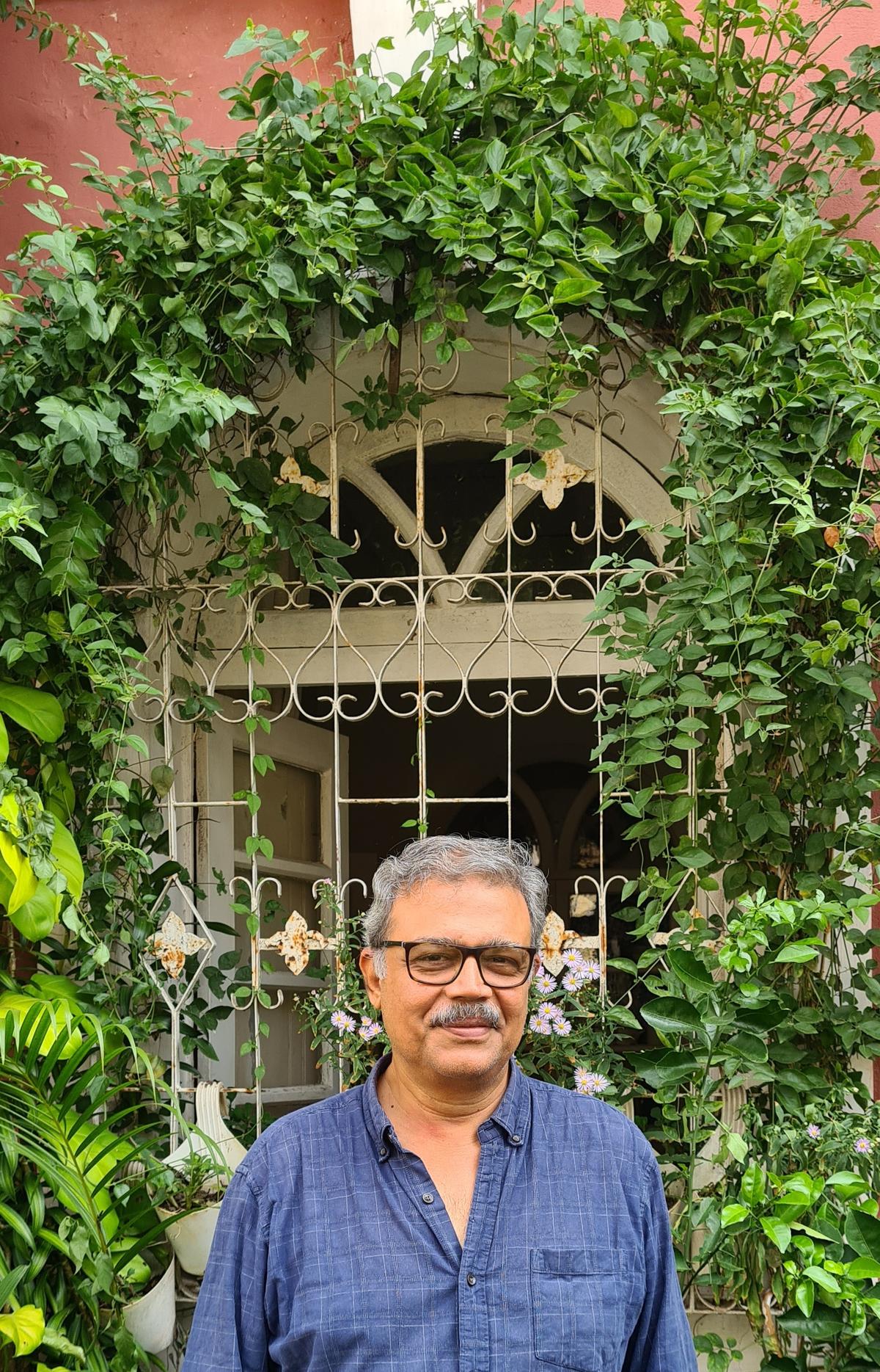 Arminio Ribeiro outside his home in Fontainhas.