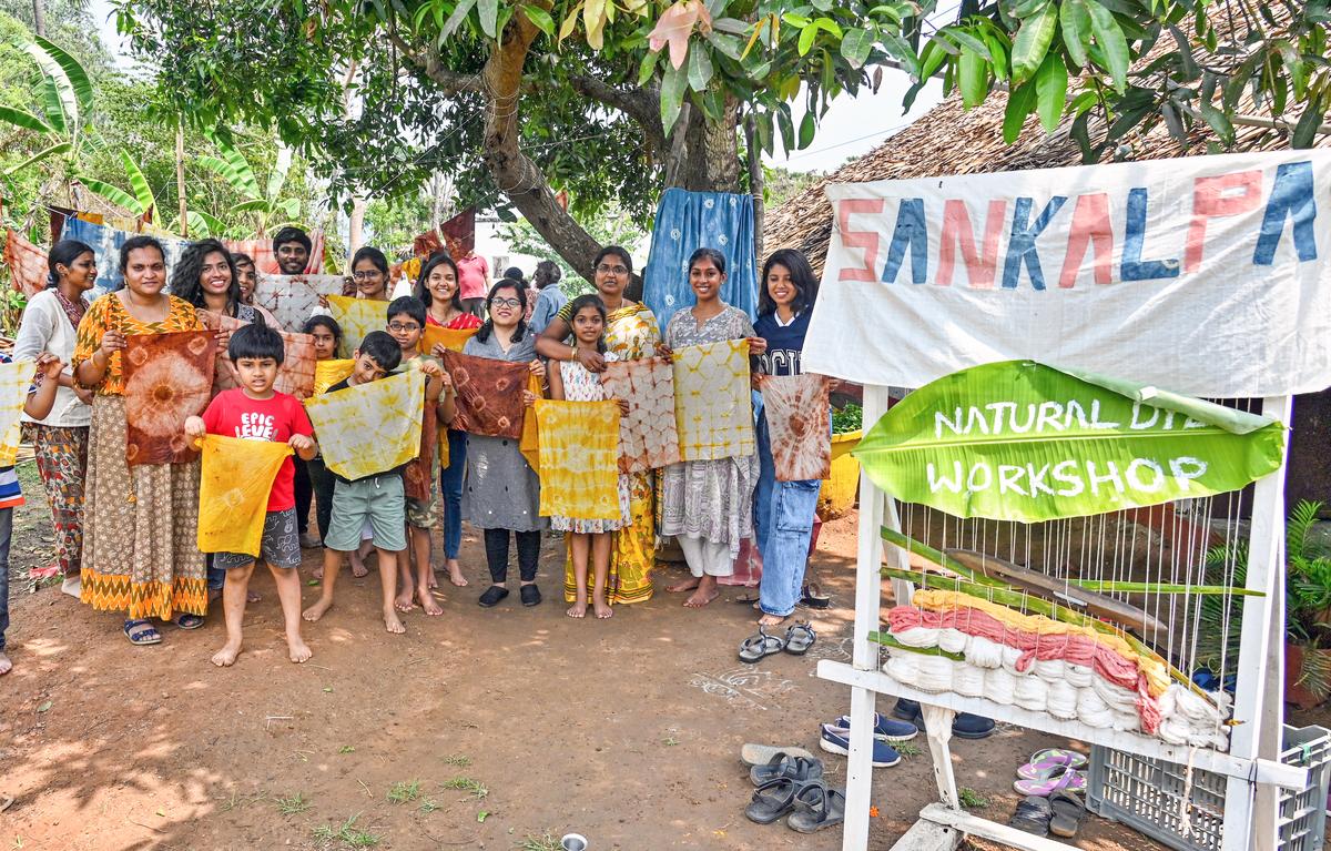 Participants displaying their natural dyed cloth at a workshop on tie and dye organised at Sankalpa Art Village in Visakhapatnam .  
