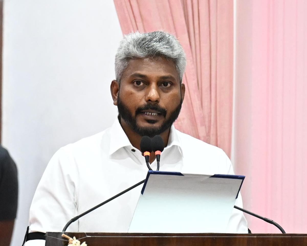 Dr. Radhakrishnan Nagar Assembly Constituency N. Marie Wilson, MLA takes the oath during the swearing-in ceremony of new ministers in Tami Nadu