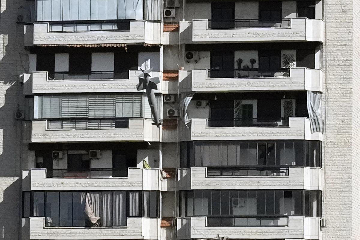 A picture clicked by AP photographer Bilal Hussein. A bomb dropped from an Israeli jet hits a building in Ghobeiri, Beirut, Lebanon, Tuesday, Oct. 22, 2024. (AP Photo/Bilal Hussein)