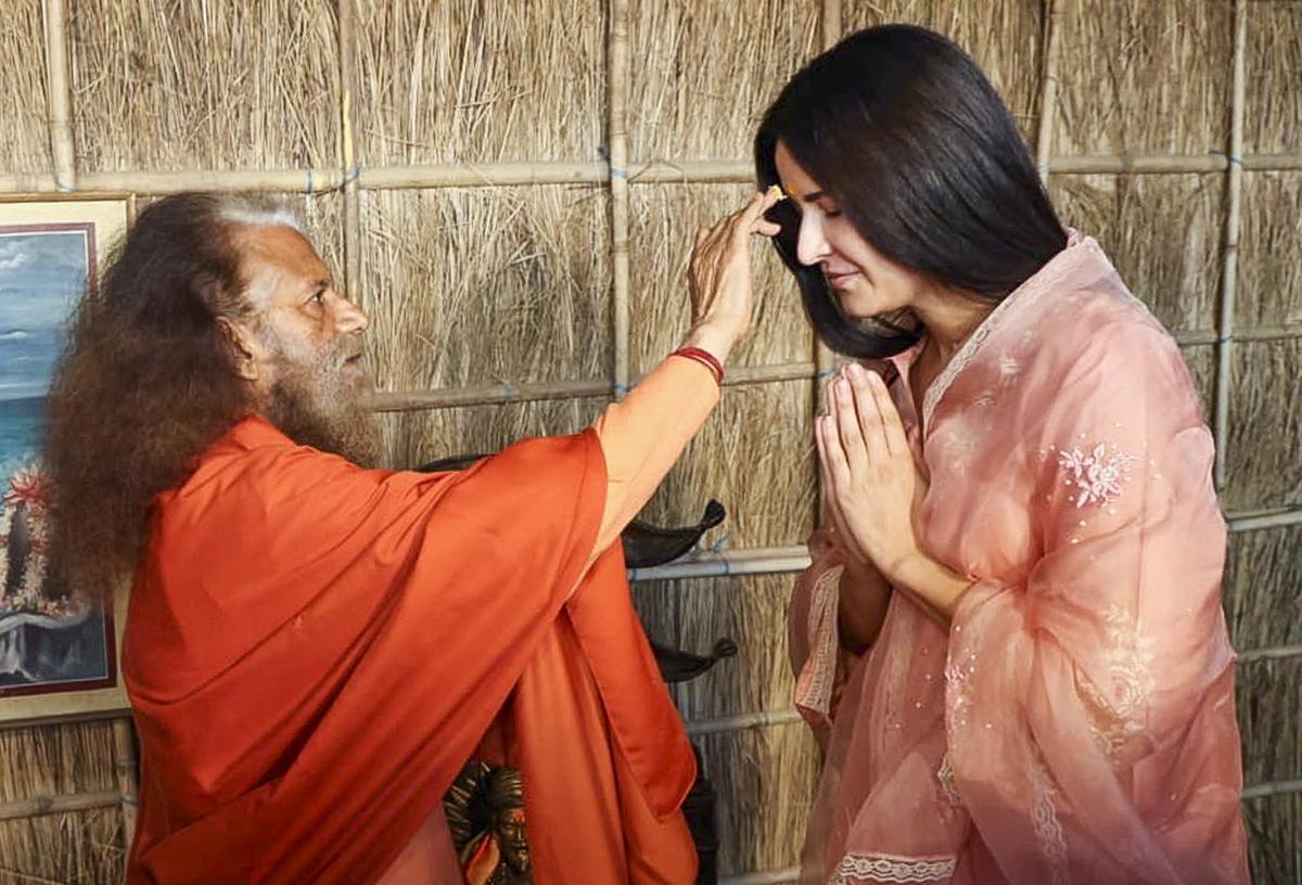 Prayagraj: Bollywood actor Katrina Kaif seeks blessings of spiritual head of Parmarth Niketan Ashram Swami Chidanand Saraswati during the ongoing Maha Kumbh Mela 2025, in Prayagraj, Monday, Feb. 24, 2025.