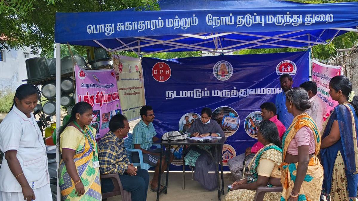 Mobile medical camps screen people for fever in rain-affected areas in Erode district