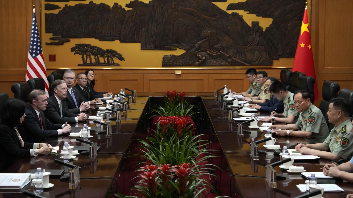 U.S. national security adviser talks with a top Chinese military official in Beijing