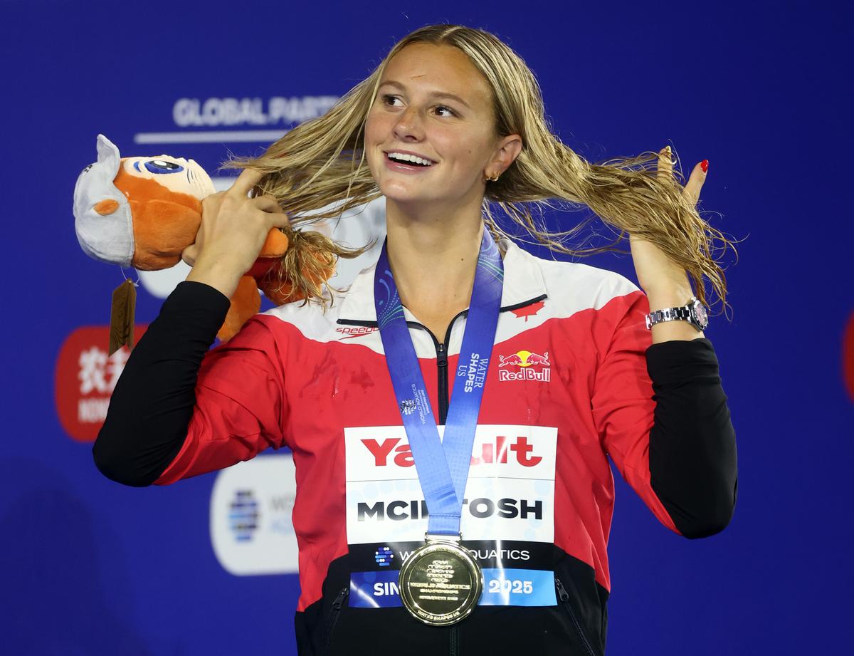 Hair-raising run: McIntosh has launched her bid to equal Phelps’ record of winning five individual gold medals in a single World Championships in commanding fashion. Hair-raising run: McIntosh has launched her bid to equal Phelps’ record of winning five individual gold medals in a single World Championships in commanding fashion.
