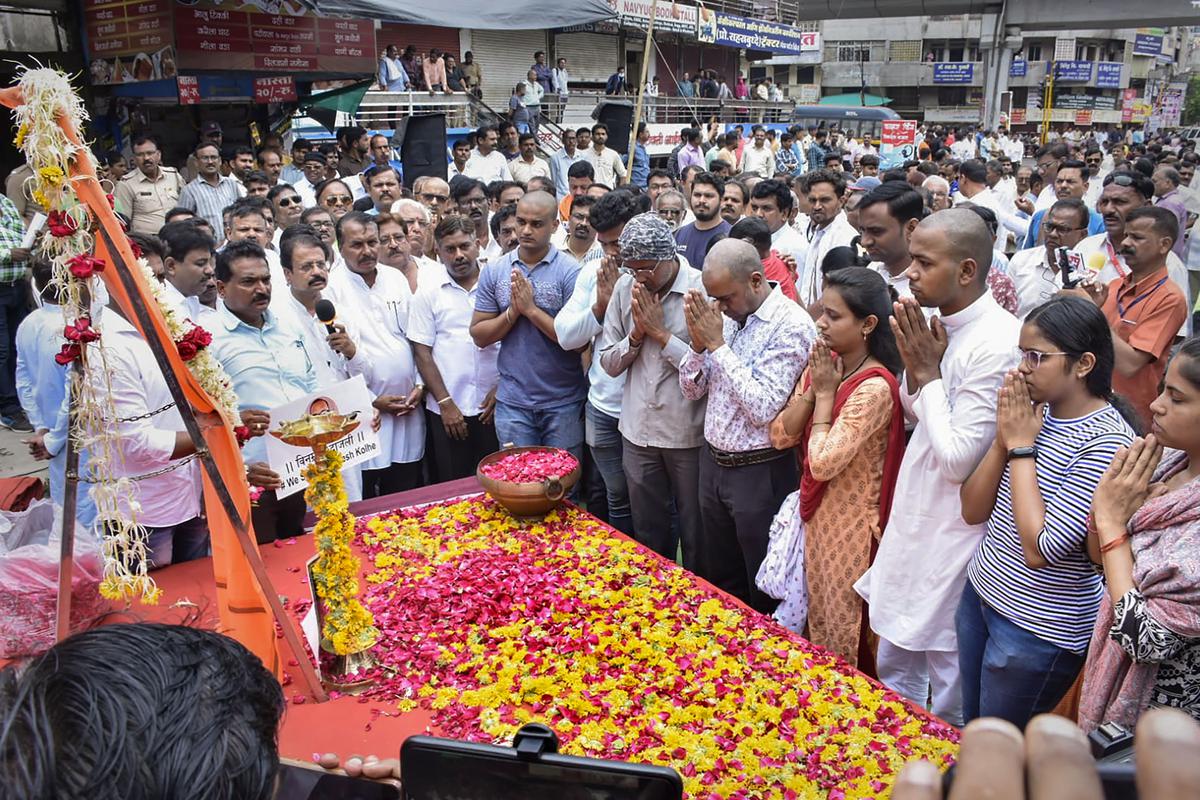 BJP workers attend a condolence meeting for chemist Umesh Kolhe in Amravat on July 4, 2022. 