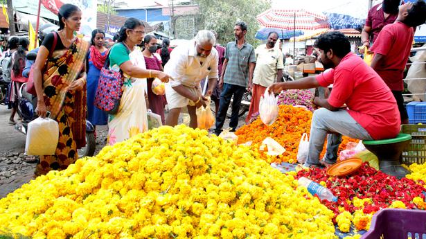 Rain strikes, but fails to douse festive spirit
