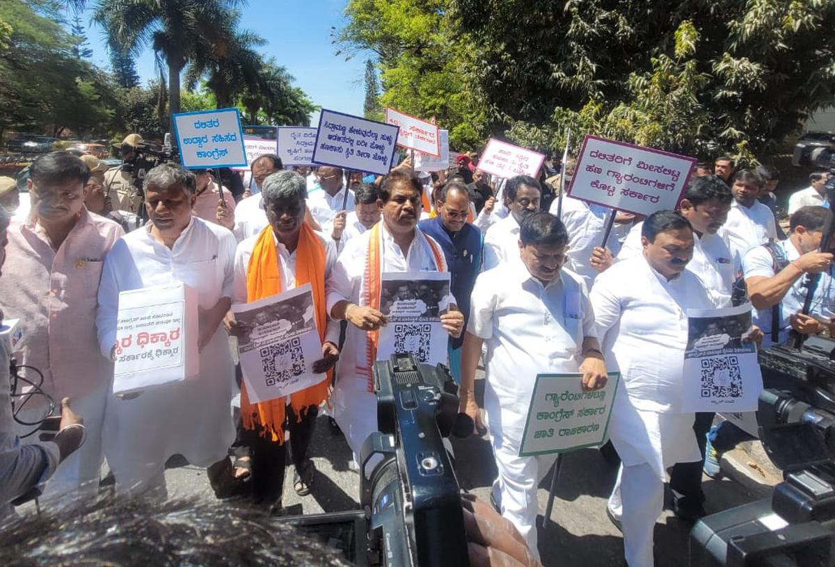 BJP legislators heading to Raj Bhavan in Bengaluru after boycotting Karnataka Assembly session on February 29, 2024.