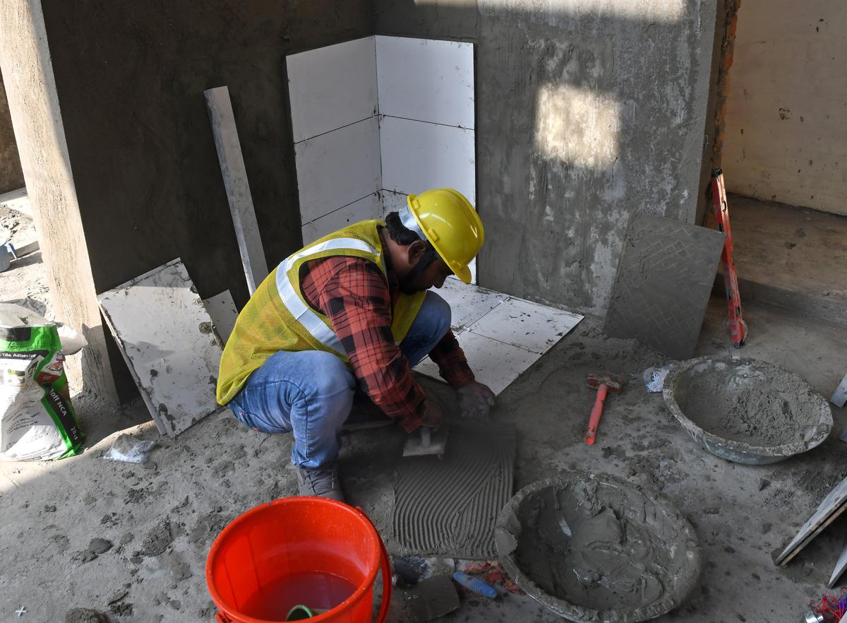 The eight-minute tile-laying test for those hoping to earn a living in Israel. 
