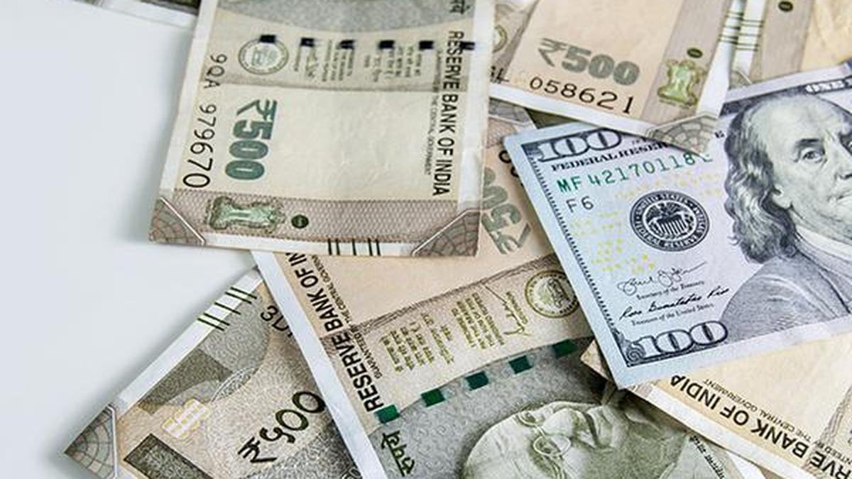 Rupee falls 14 paise to close near all-time low level at 94.82 against U.S. dollar