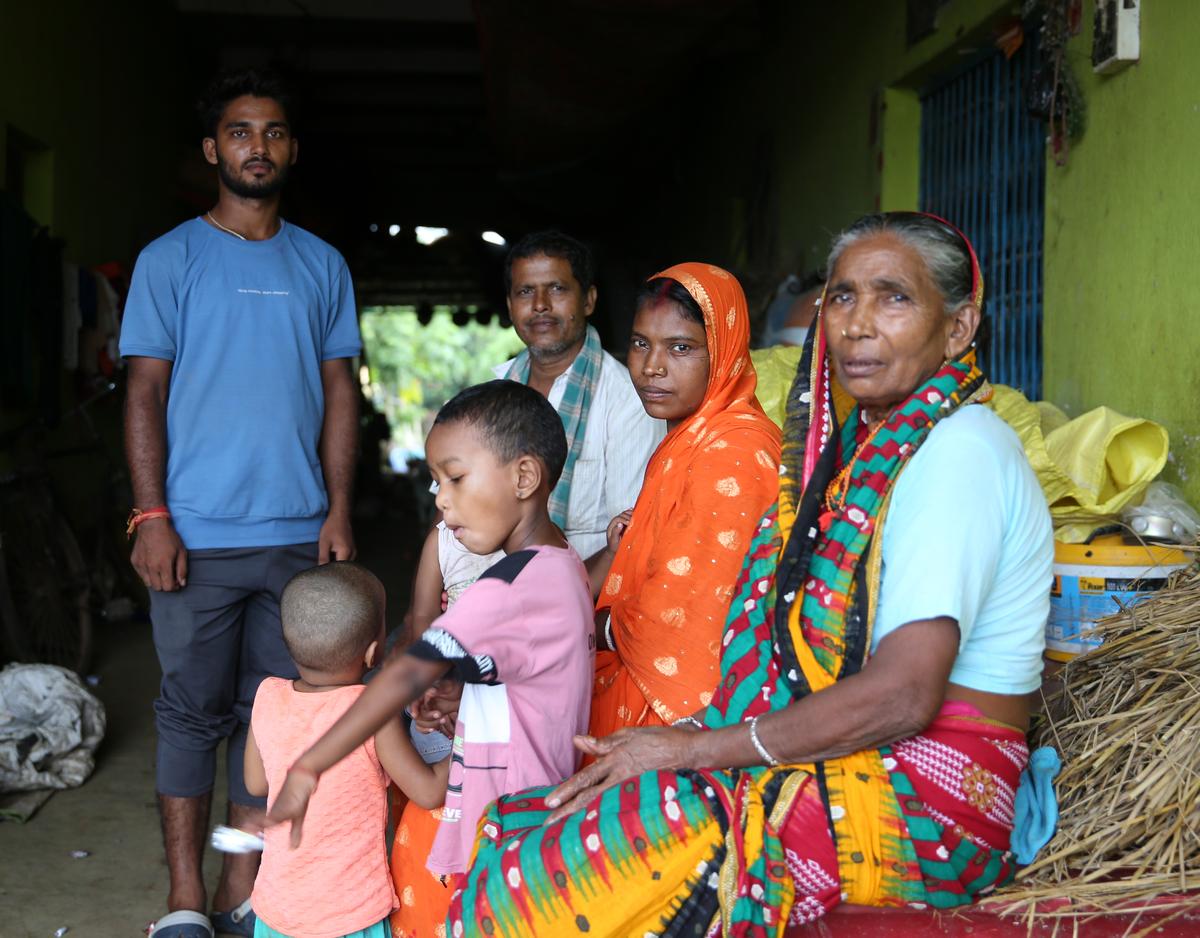 Kapru Tudu, Mukhiya of Mayurkola, with her children and family members in Jharkhand’s Santhal Pargana region.