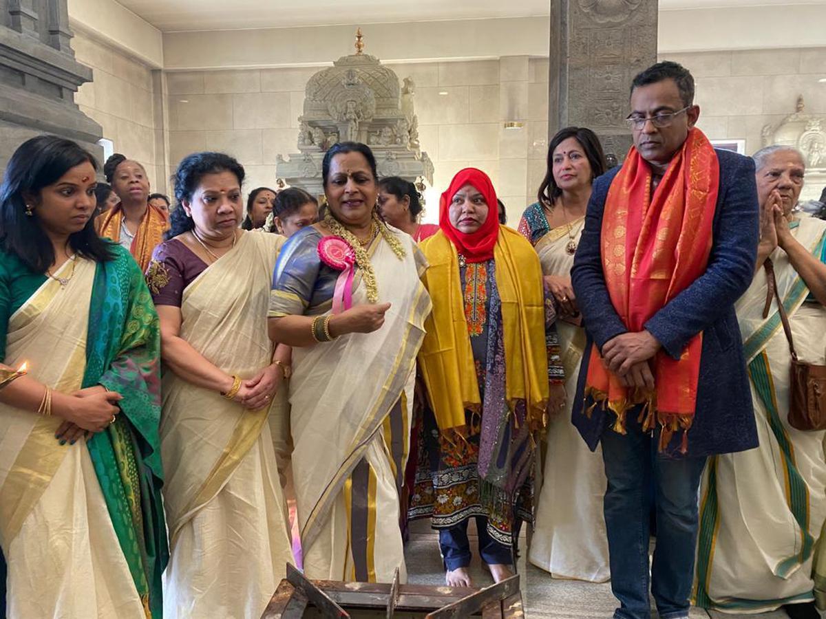 Devotees led by Omana Gangadharan cooking Pongala at  London Sree Murugan Temple, London. 