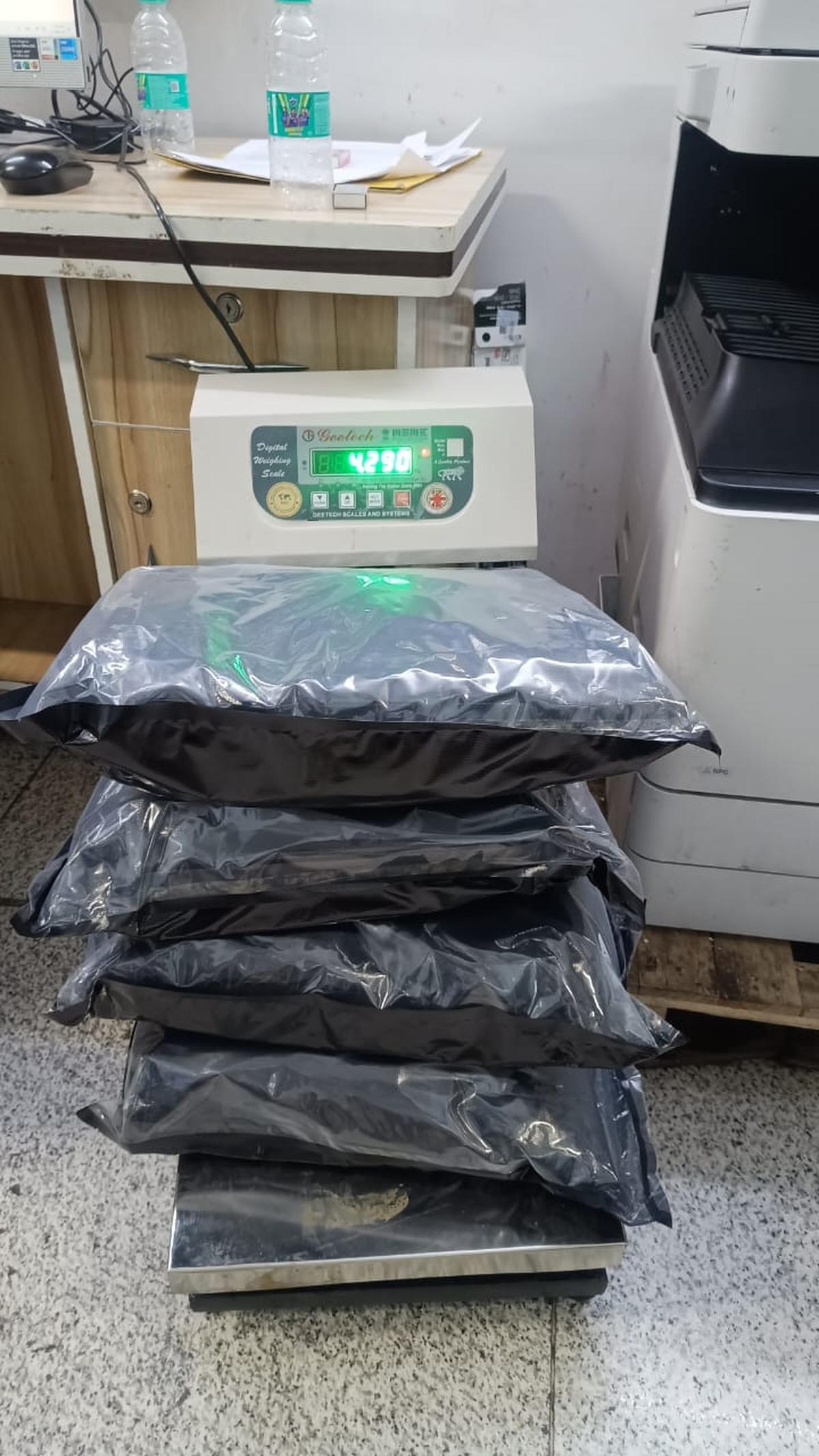 thehindu.com - Pti - Marijuana worth ₹4 crore, concealed in trolley bag seized at Delhi airport; two held