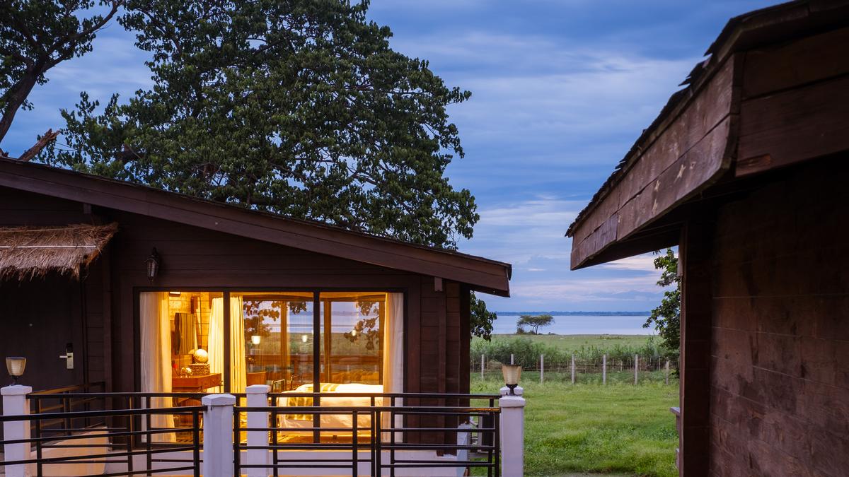 View of the cottage with the river in the background