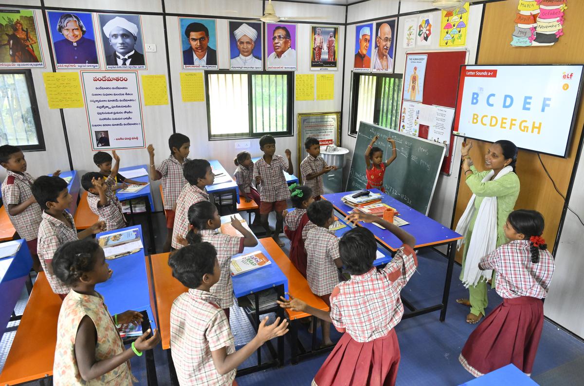 A teacher holding the rapt attention of her students in the container classroom at Bangarupalli hamlet in Kannaigudem mandal of Mulugu district.