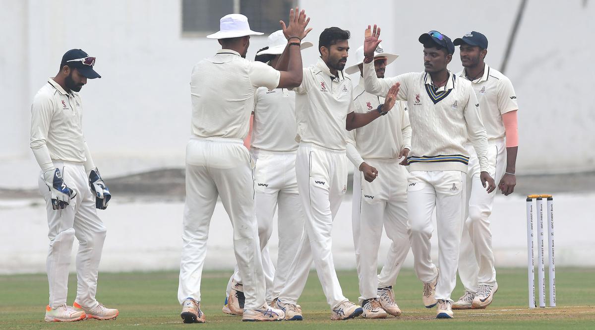 Tamil Nadu team celebrates during the Ranji Trophy match against Gujarat.