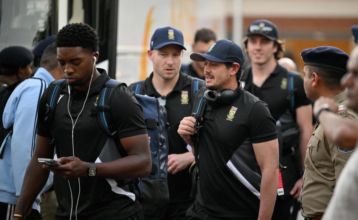 South Africa's Quinton De Kock and David Miller arrive at the Sardar Vallabhbhai Patel International Airport ahead of their fifth and final T20 International against India in Ahmedabad, scheduled for  December 19, 2025.