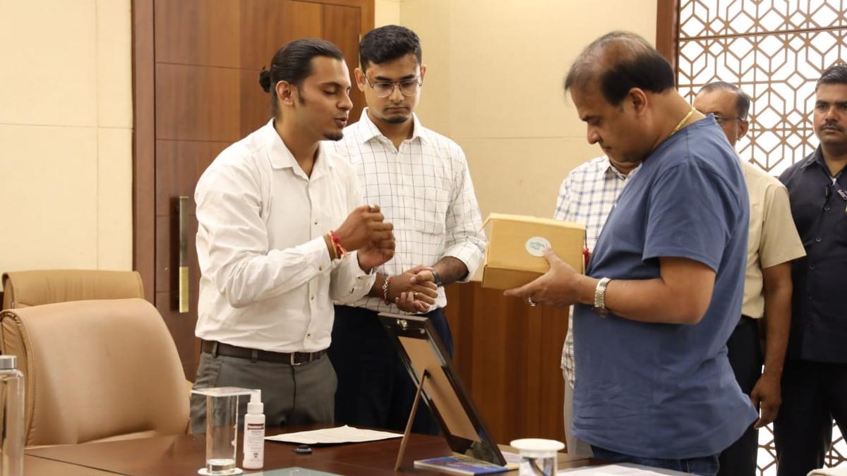 Rupankar and Aniket of Kumbhi Kagaz with the Chief Minister of Assam Rupankar and Aniket of Kumbhi Kagaz with the Chief Minister of Assam