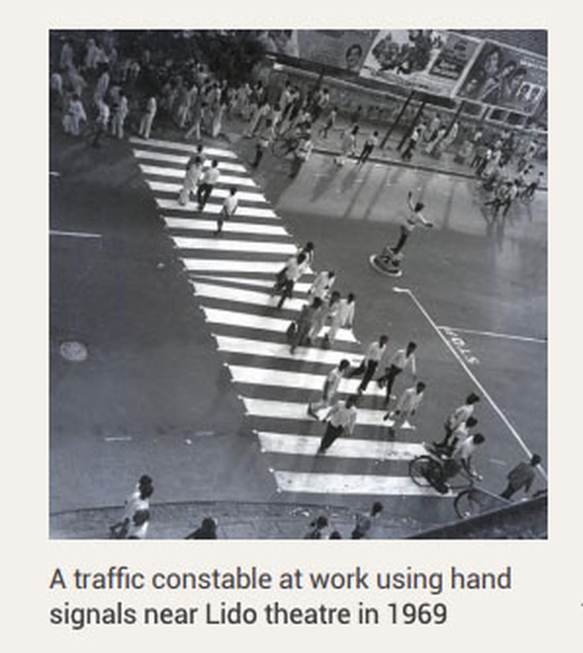 A traffic constable at work using hand signals near Lido Theatre in 1969.