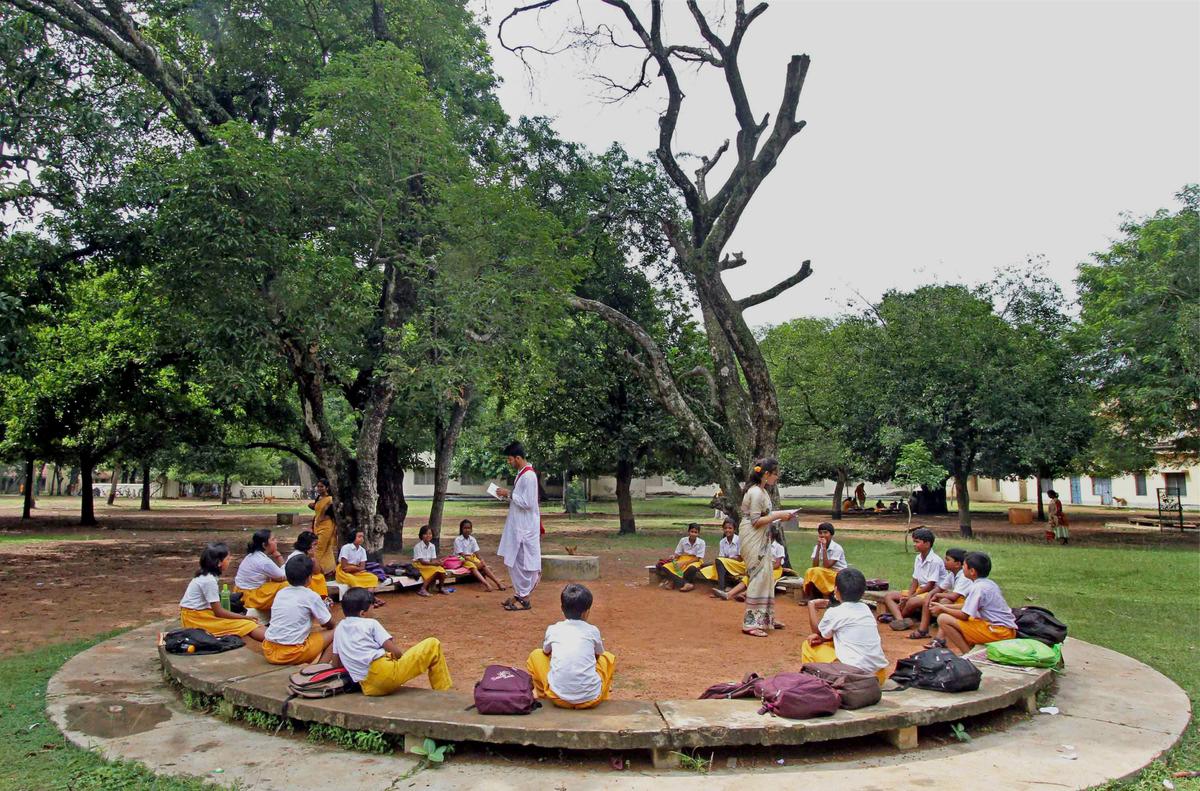 Children in an open air classroom at Patha-Bhavana inside Visva-Bharati University campus in Santiniketan.