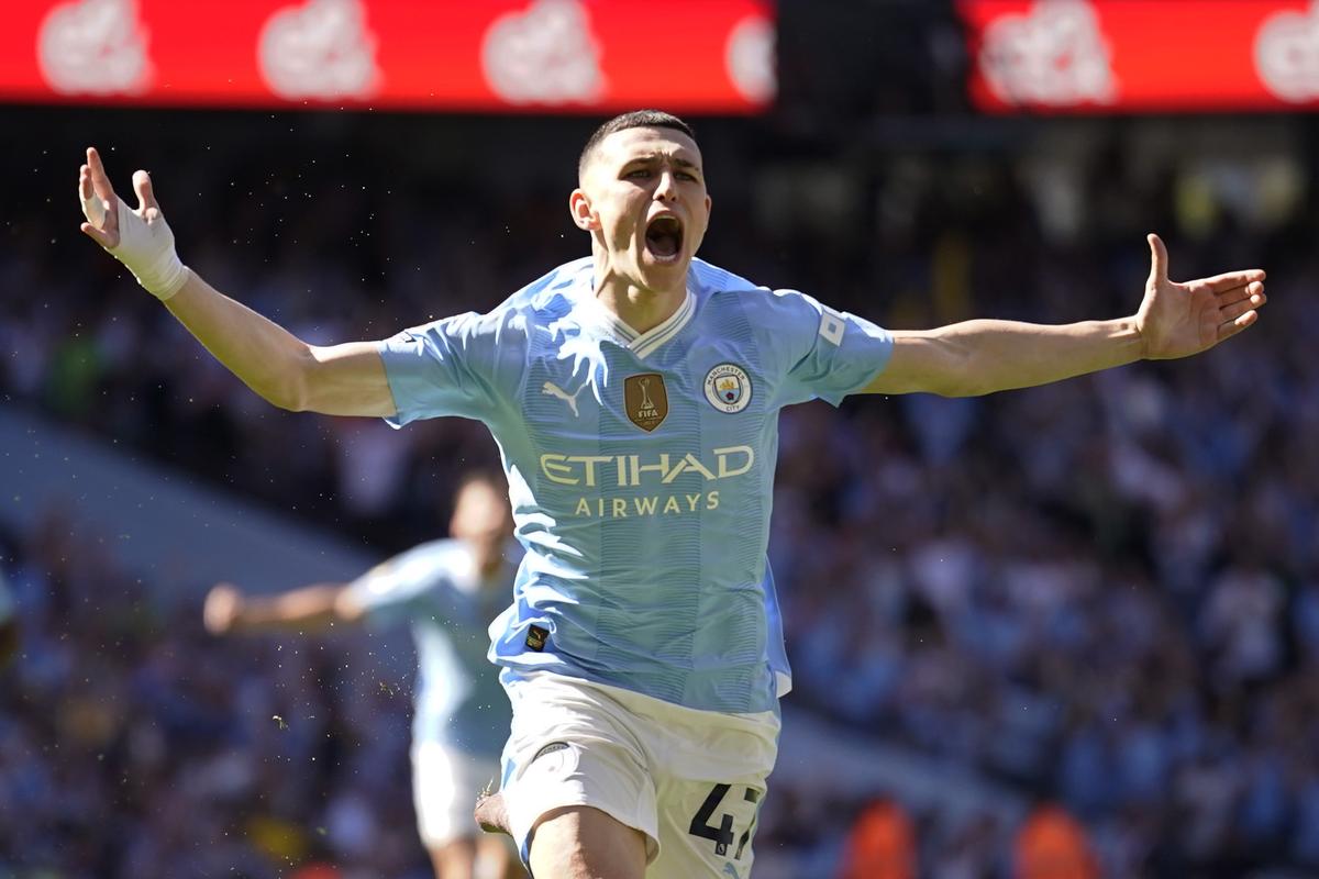 Manchester City’s Phil Foden celebrates after scoring his side’s opening goal during the English Premier League soccer match between Manchester City and West Ham United at the Etihad Stadium in Manchester, on May 19, 2024. 