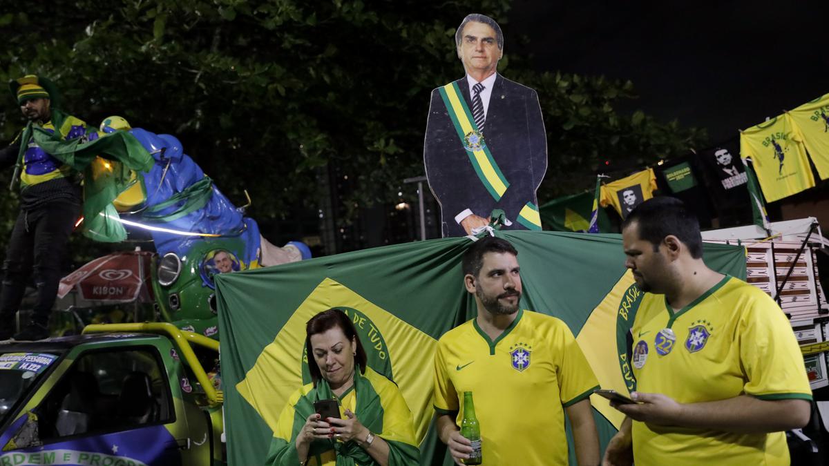 Bolsonaro, Lula headed to runoff after tight Brazil election