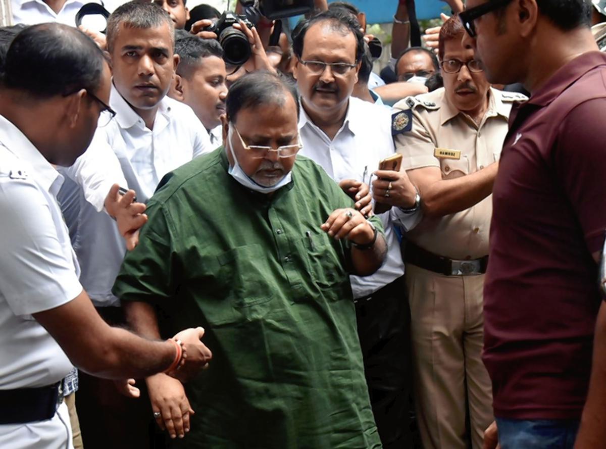 Former Industries and Commerce Minister Partha Chatterjee being produced before a court in Kolkata. 