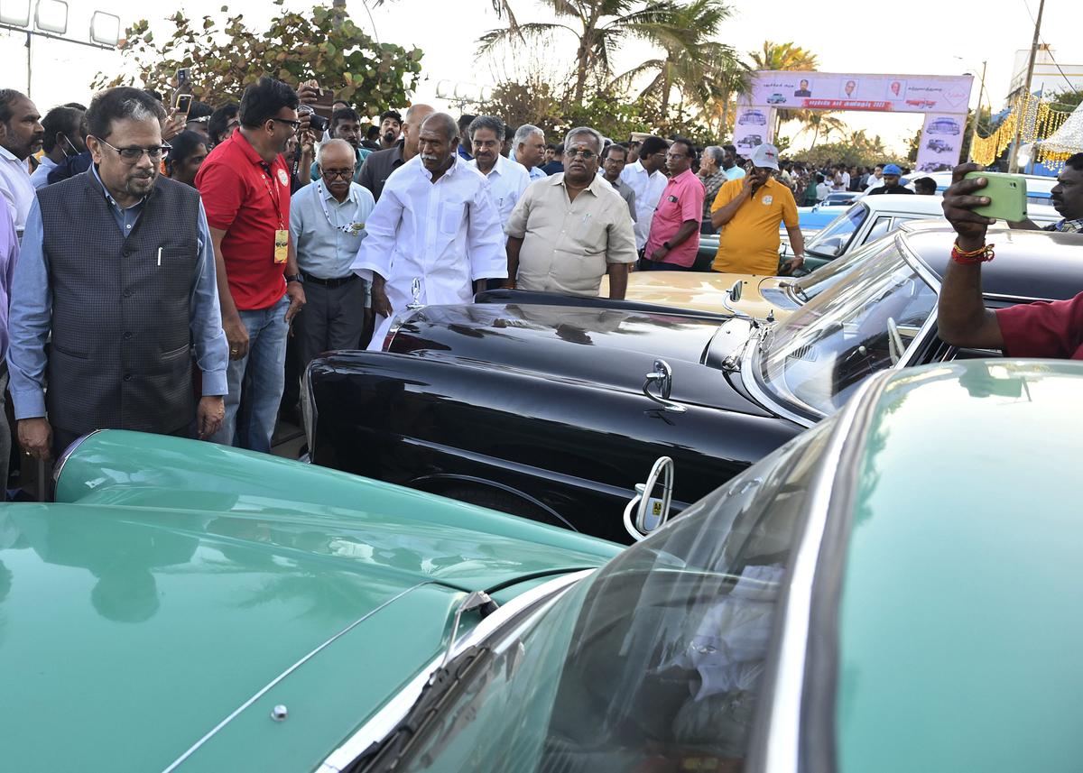 L-G Kailashnathan and CM Rangasamy looking at the fleet of heritage cars. 