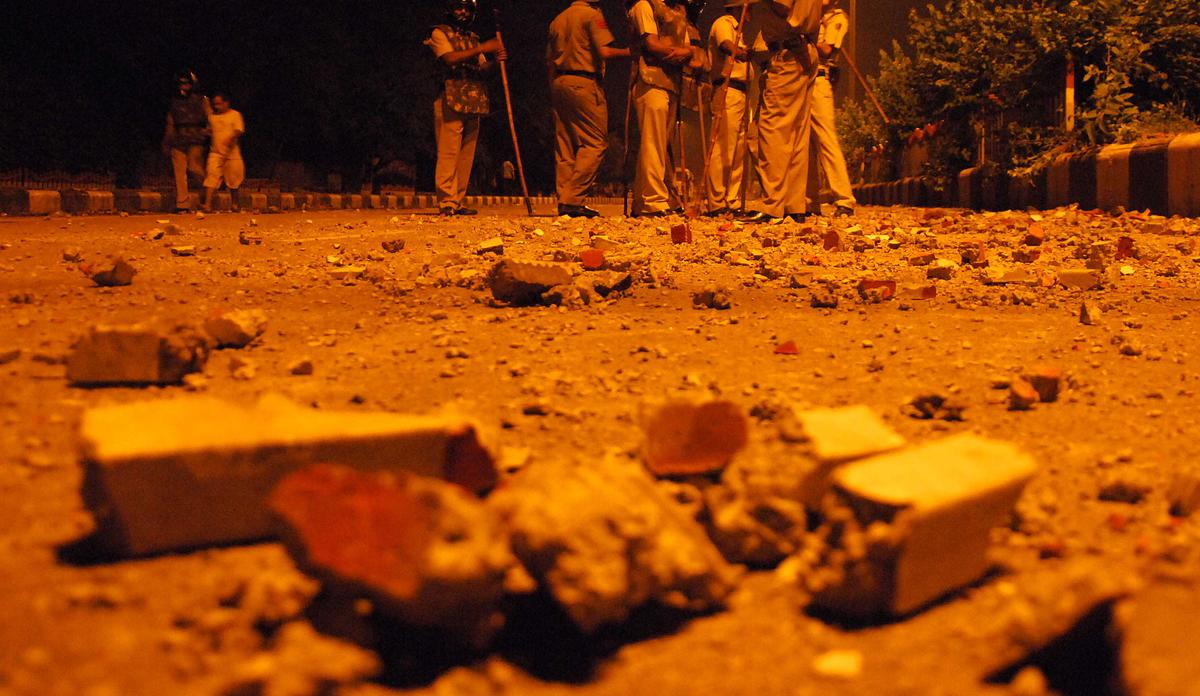 Nepal residents pelt stones on workers constructing embankment on Kali River in Uttarakhand