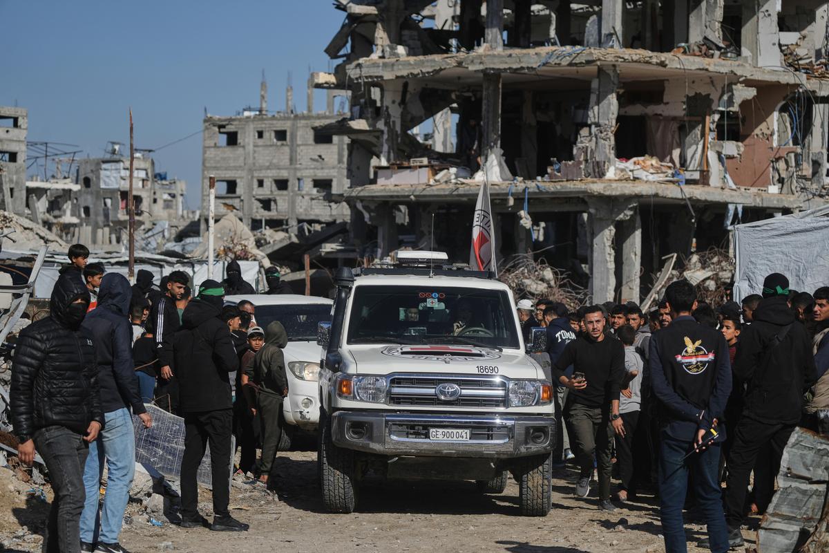 Members of the International Committee of the Red Cross (ICRC) arrive at the site where Hamas militants are searching for the remains of hostages in Jabalia, northern Gaza Strip, on Monday, Dec. 1, 2025. Members of the International Committee of the Red Cross (ICRC) arrive at the site where Hamas militants are searching for the remains of hostages in Jabalia, northern Gaza Strip, on Monday, Dec. 1, 2025.