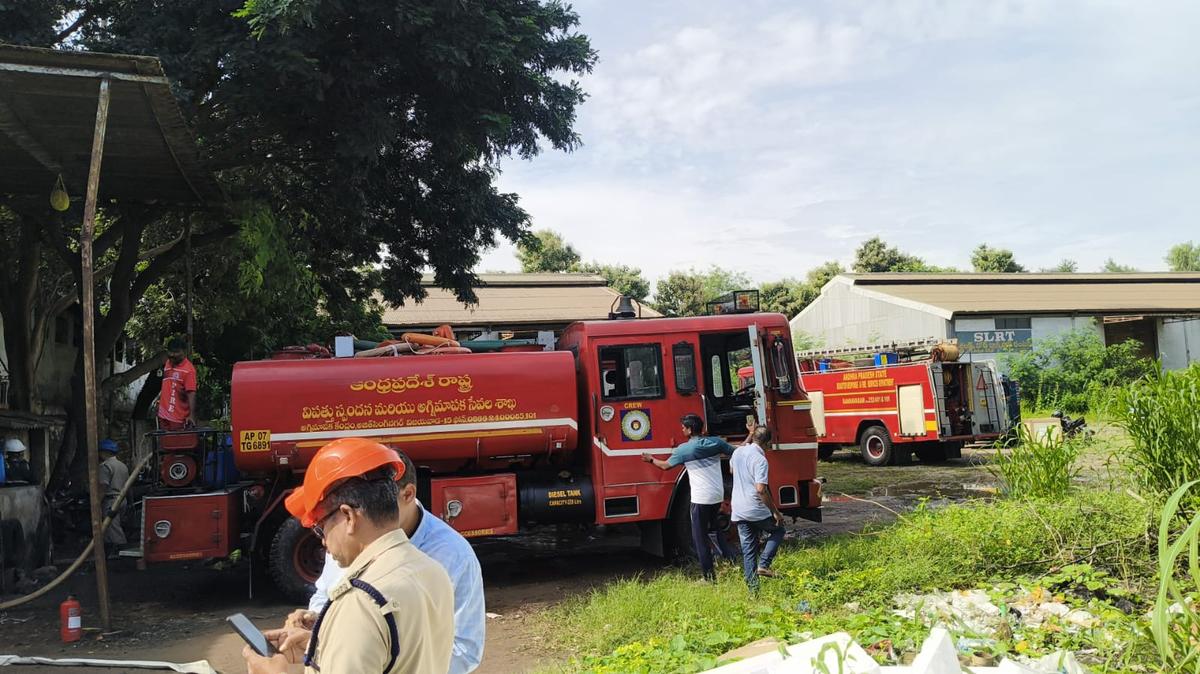 The fire tenders at the site of fire mishap in a godown at Enikepadu village on outskirts of Vijayawada on Monday (October 06, 2025). The fire tenders at the site of fire mishap in a godown at Enikepadu village on outskirts of Vijayawada on Monday (October 06, 2025).
