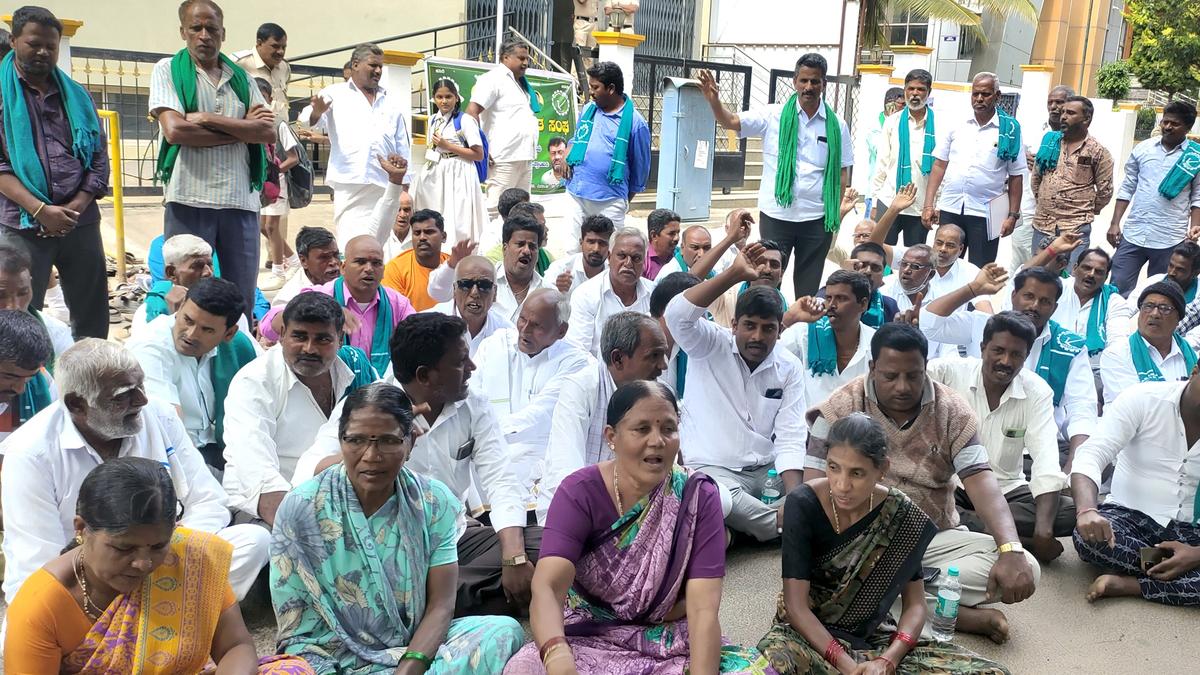 Residents village turn up in front of Excise Dept. office in Mysuru to oppose liquor shop