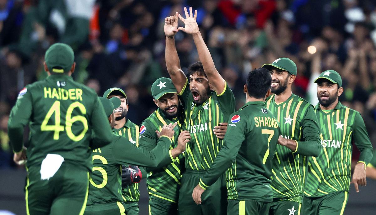 Pakistan’s Haris Rauf, centre, celebrates with teammates after taking the wicket of India’s Suryakumar Yadav during the T20 World Cup cricket match between India and Pakistan on October 23, 2022.