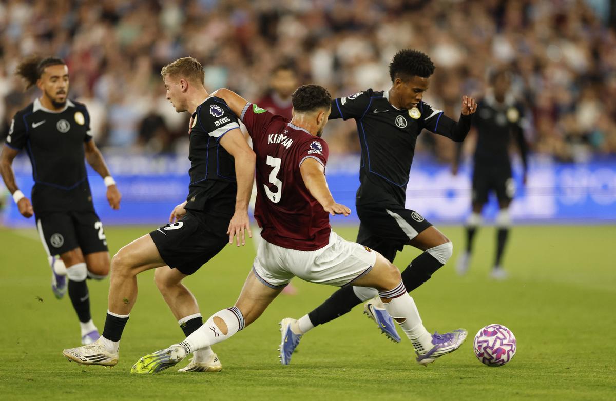 West Ham United’s Maximilian Kilman tries to tackle Chelsea’s Estevao 