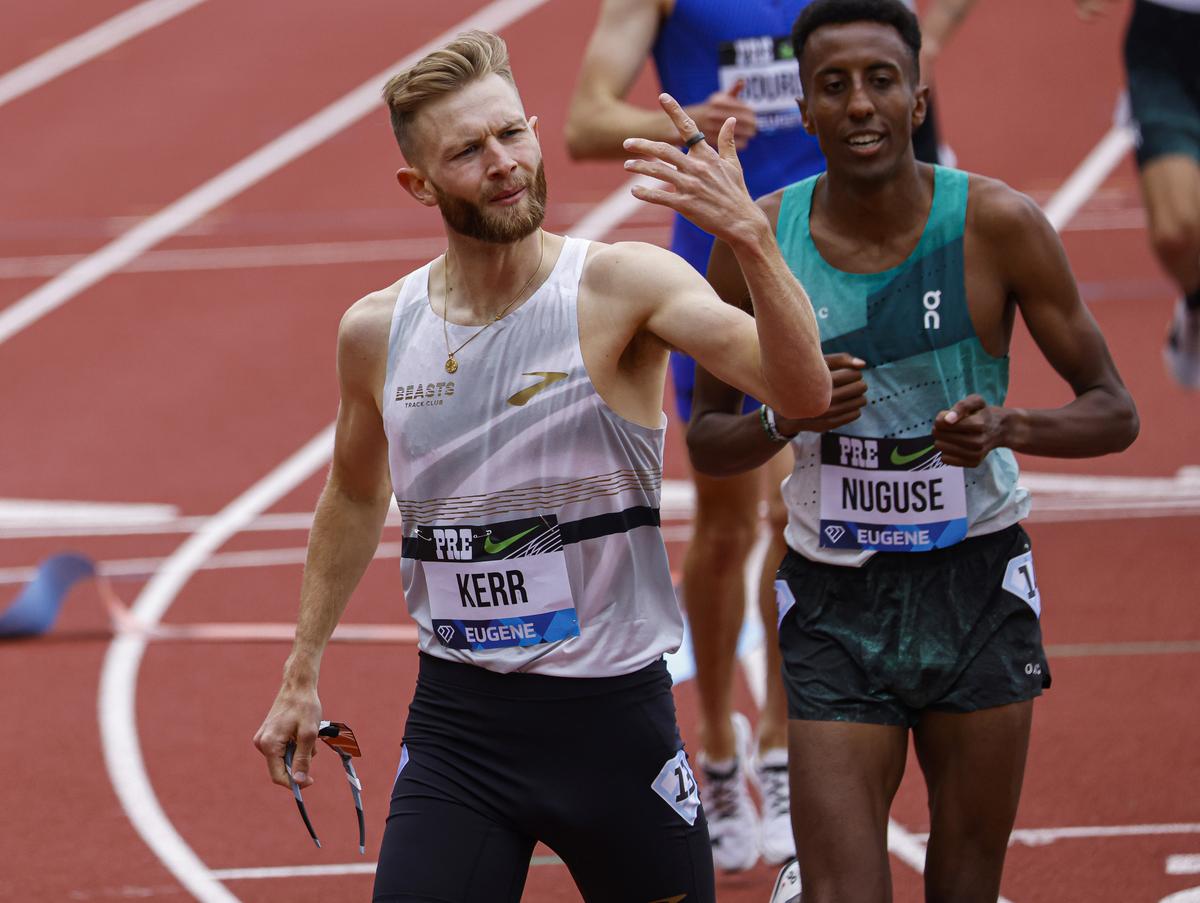 Josh Kerr, of Scotland, gestures after winning the men’s mile during the Prefontaine Classic track and field meet.