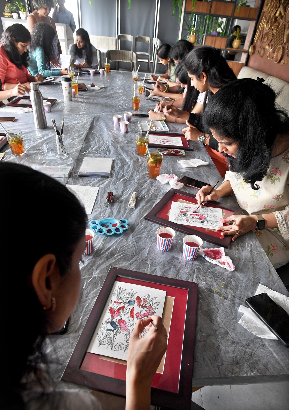Participants at the sip and paint event conducted by Kaleidoscope in Visakhapatnam 