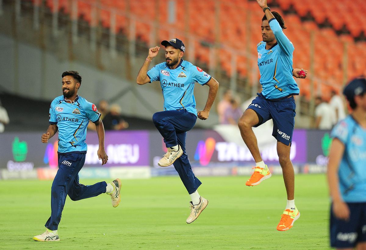 Grinding it out: The Gujarat Titans team members having a workout on the eve of the final.