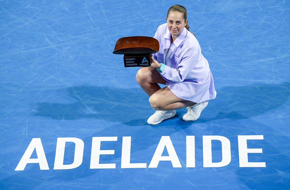 Jelena Ostapenko of Latvia poses with the Womens Singles Champion trophy after her match against  Daria Kasatkina in the 2024 Adelaide International at Memorial Drive on January 13, 2024 in Adelaide, Australia.