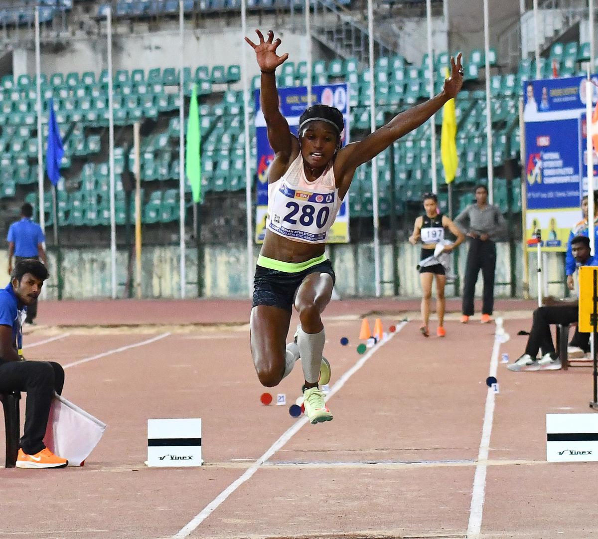B. Aishwarya, who won the women’s triple jump event, competes during the 61st National Inter-State Senior Athletics Championships in Chennai on June 13, 2022. 