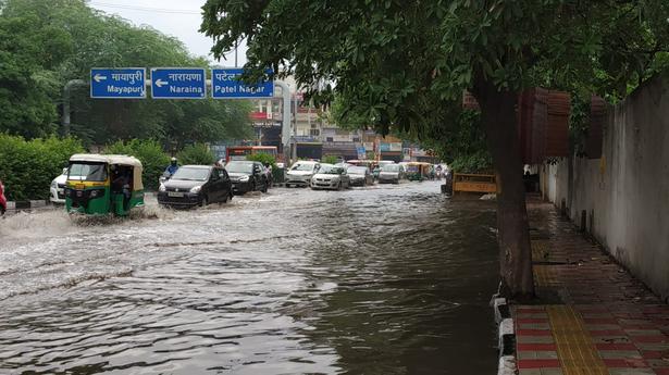 Rains in Delhi give respite from sultry weather, cause traffic snarls
