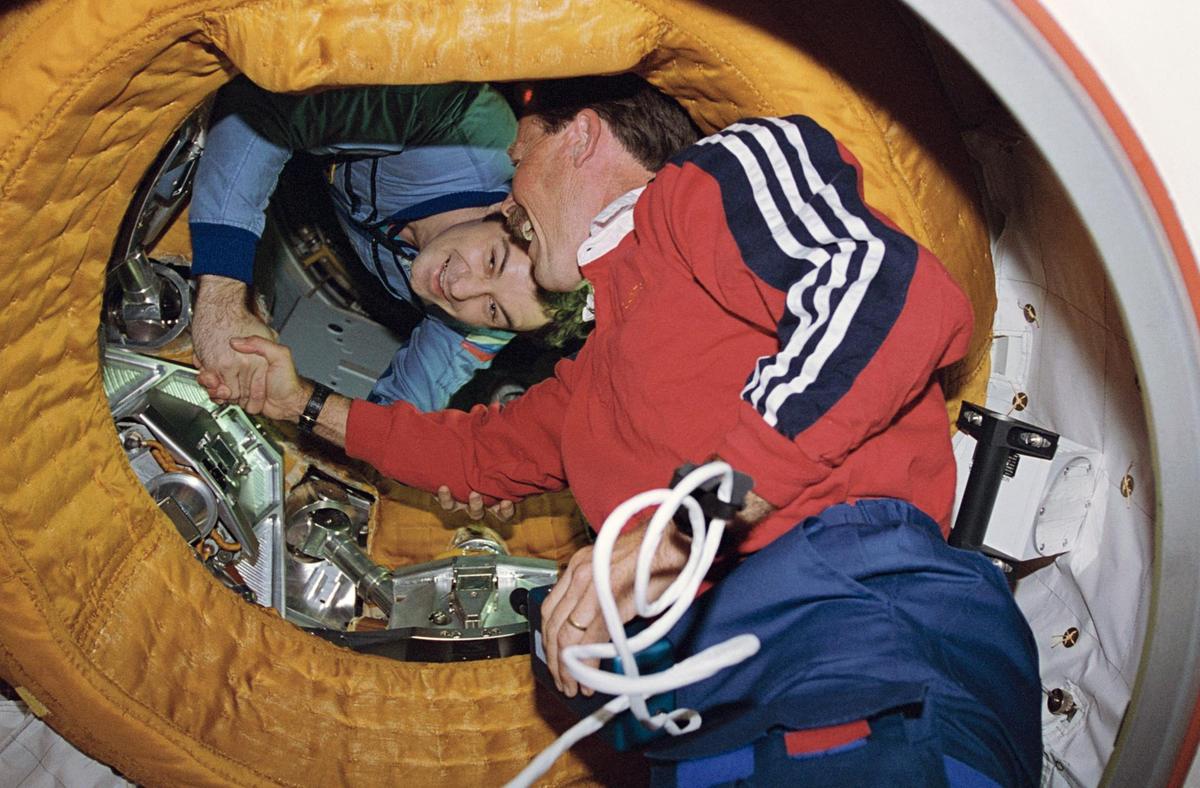 Astronaut Robert L. Gibson, STS-71 commander, shakes the hand of cosmonaut Vladimir N. Dezhurov, Mir-18 commander, on June 29, 1995. Astronaut Robert L. Gibson, STS-71 commander, shakes the hand of cosmonaut Vladimir N. Dezhurov, Mir-18 commander, on June 29, 1995.