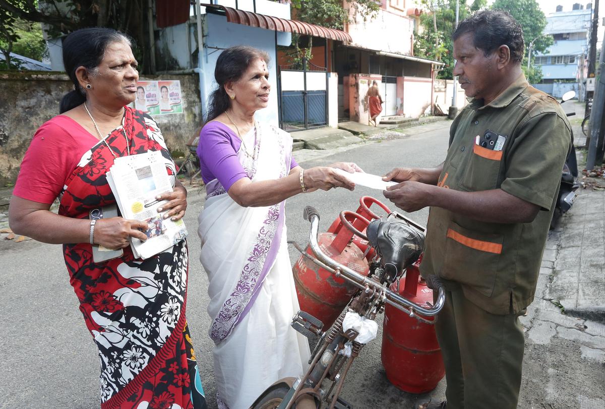 Rukmini Nambeeshan, LDF candidate, canvassing votes. 
