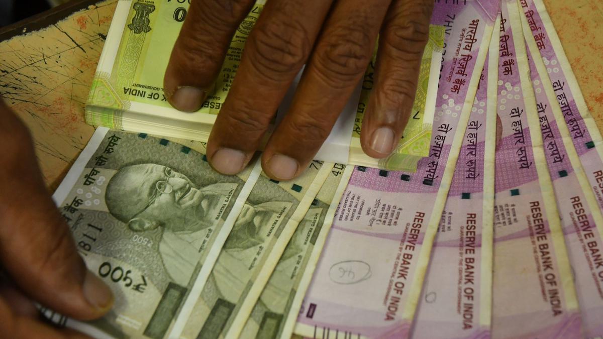 Rupee trades flat against U.S. dollar in early trade