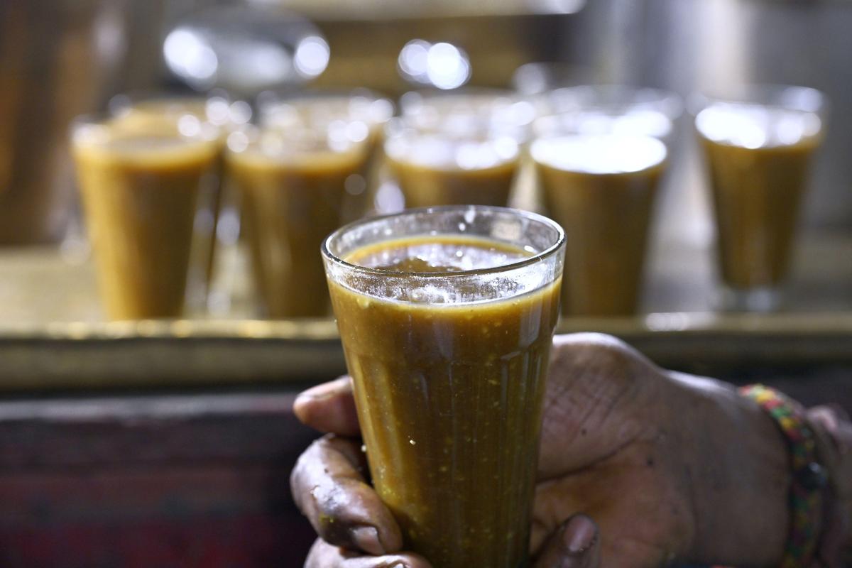  K.Santhanam serving hot Paruthipaal (cottonseed milk) at his shop in Madurai. 