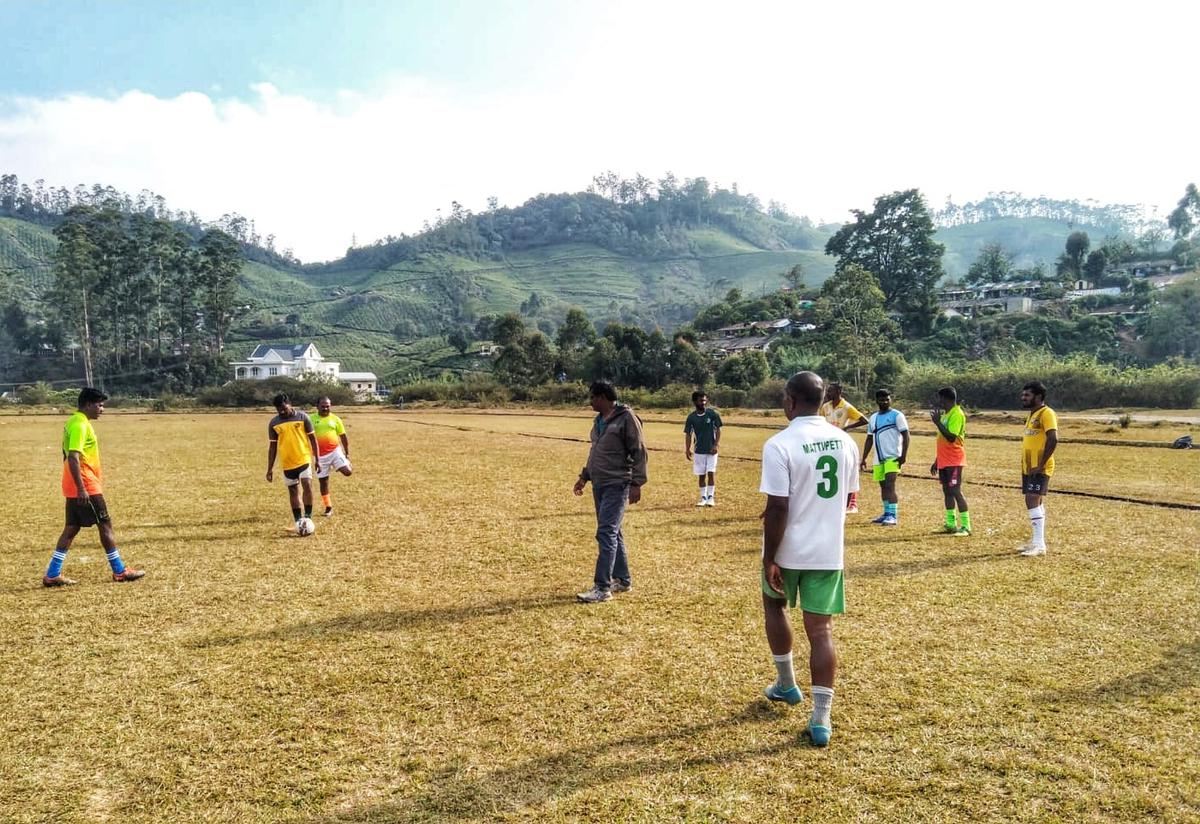 Mattuppetty Estate team practising for the Tata Finlay shield football tournament at the Munnar High Altitude stadium on Friday.