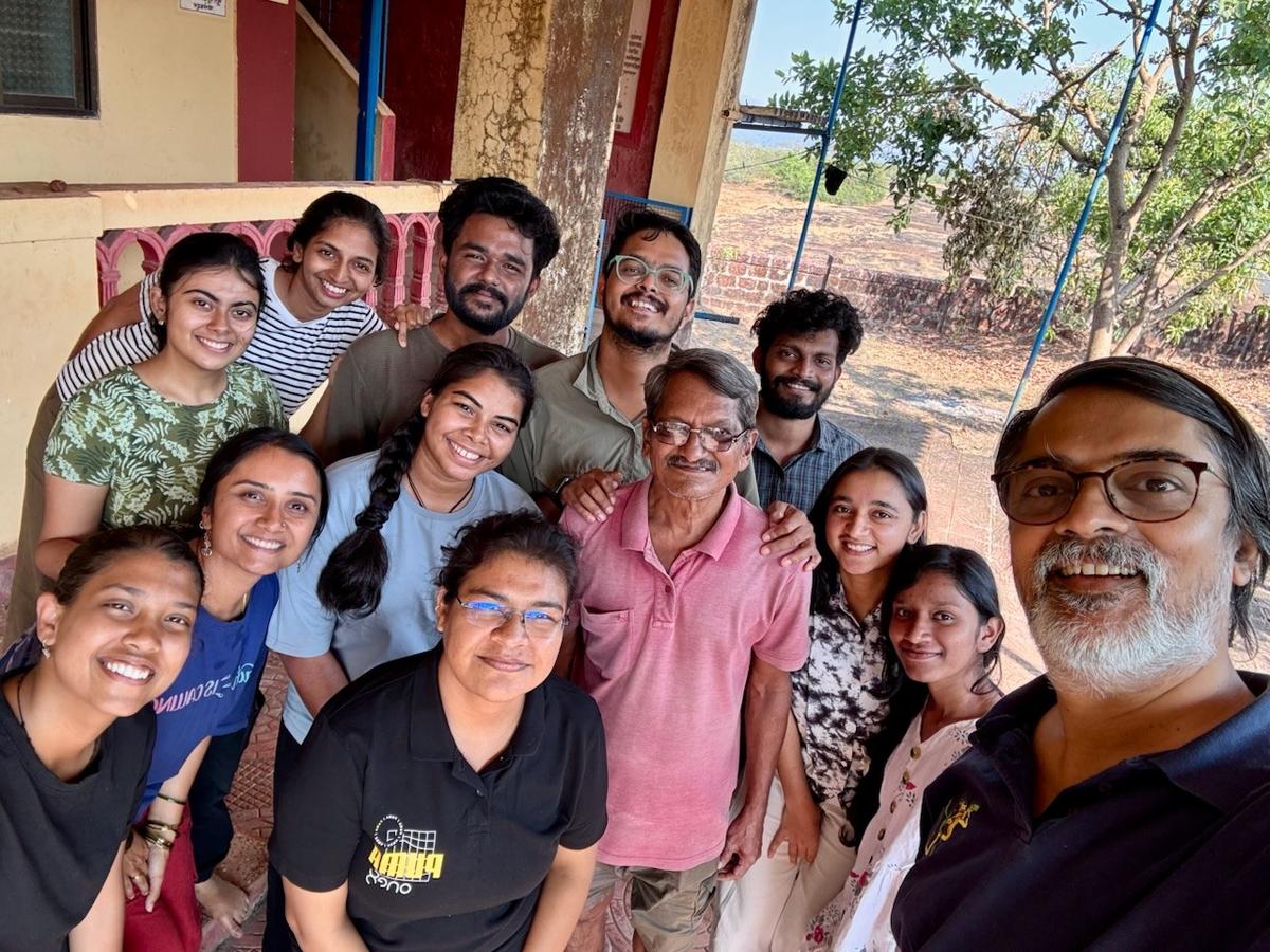 The award-winning conservation biologist with his team The award-winning conservation biologist with his team