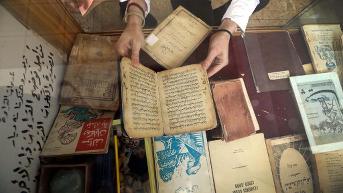 ‘Sacred job’: Iraq Kurds digitise books to save threatened culture